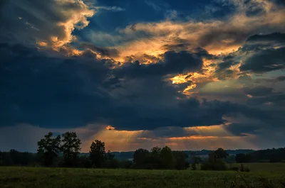 Dramatic Sunset Over Rural Landscape With Storm Clouds - free wallpaper 4928×3264