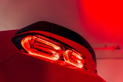 Illuminated Red Car Taillight Against Red Background - free cars & vehicles wallpaper 6000×4000
