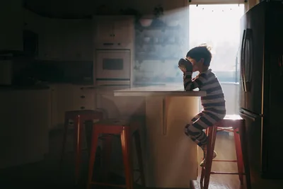 Child at Kitchen Counter in Morning Sunlight - free people & portraits wallpaper 5649×3771