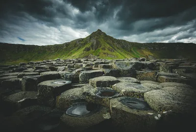 Hexagonal Basalt Columns with Moss-Covered Mountain - free landscapes wallpaper 5924×4000