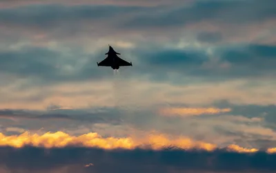 Fighter Jet Silhouette Against Dramatic Sunset Clouds - free cars & vehicles wallpaper 4702×2939