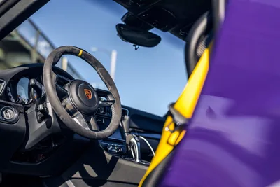 Porsche Sports Car Interior with Yellow Body Detail - free wallpaper 6720×4480