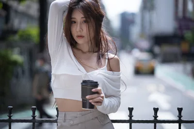 Woman in White Crop Top by Urban Fence - free wallpaper 4000×2658