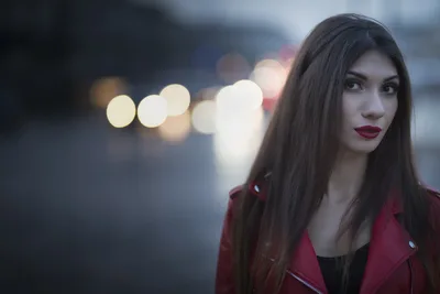 Woman in Red Jacket Against Bokeh City Lights - free wallpaper 3000×2000