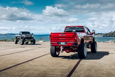 Custom Lifted Trucks at Waterfront Park Display - free cars & vehicles wallpaper 6411×4274