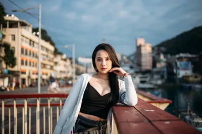 Woman Posing on Rooftop Overlooking Urban Valley - free people & portraits wallpaper 4000×2657