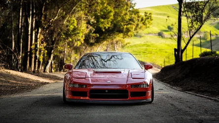 Red Sports Car on Rural Tree-Lined Road - free cars & vehicles wallpaper 5616×3158