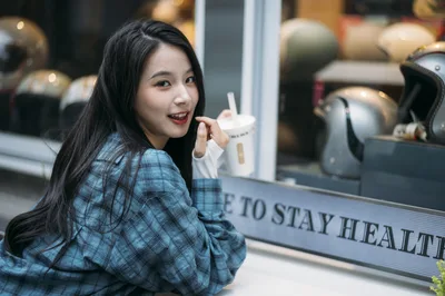 Young Woman with Beverage at Urban Storefront - free people & portraits wallpaper 4000×2658
