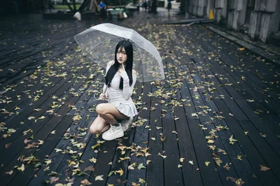 Woman With Umbrella on Autumn Leaf Covered Boardwalk - free people & portraits wallpaper 4000×2658
