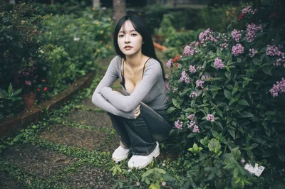 Woman Posing Among Pink Flowers in Garden - free people & portraits wallpaper 4000×2658