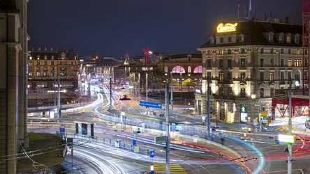 Nighttime City Square with Light Trails and Historic Buildings - free city & urban wallpaper 3000×1687