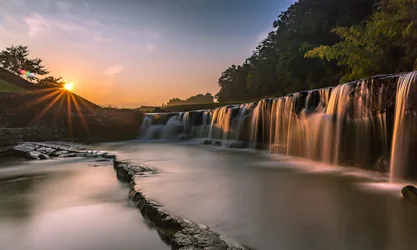 Cascading Waterfall at Golden Sunrise - free landscapes wallpaper 1920×1151