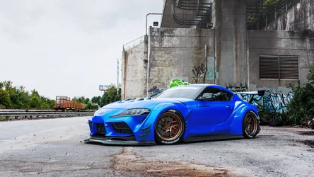 Blue Toyota GR86 Sports Car in Industrial Urban Setting - free cars & vehicles wallpaper 1920×1080