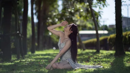 Woman Sitting in Tree-Lined Park on Grass - free people & portraits wallpaper 4000×2249