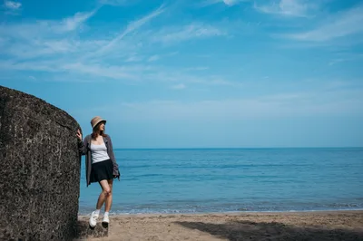Woman Standing by Concrete Wall at Beach - free people & portraits wallpaper 3000×1992