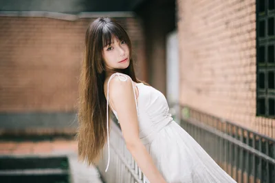 Woman in White Dress by Brick Building - free people & portraits wallpaper 4000×2658