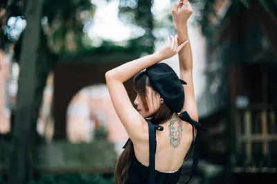 Woman With Tattoo Posing Outdoors in Black Cap - free people & portraits wallpaper 4000×2658