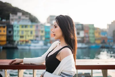 Woman Overlooking Colorful Waterfront Harbor - free people & portraits wallpaper 4000×2657
