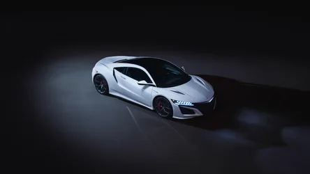 White Sports Car in Dark Studio Setting - free cars & vehicles wallpaper 3840×2160