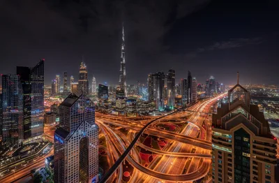 Dubai Skyline at Night with Burj Khalifa and Highway - free city & urban wallpaper 1920×1258
