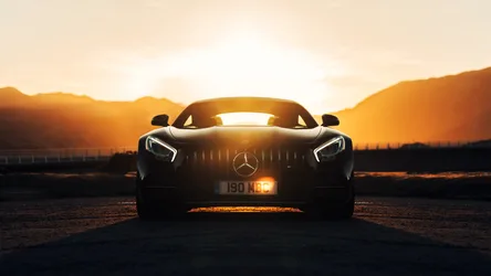 Mercedes-AMG Sports Car at Sunset with Mountain Backdrop - free wallpaper 4096×2304