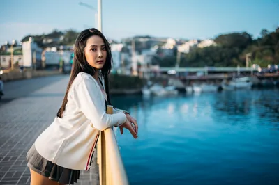 Woman in White Cardigan at Waterfront Marina - free people & portraits wallpaper 4000×2656