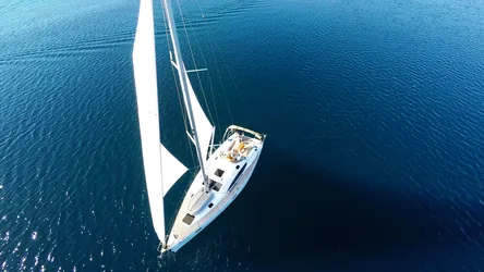 Aerial View of White Sailboat on Clear Blue Ocean - free cars & vehicles wallpaper 3840×2160
