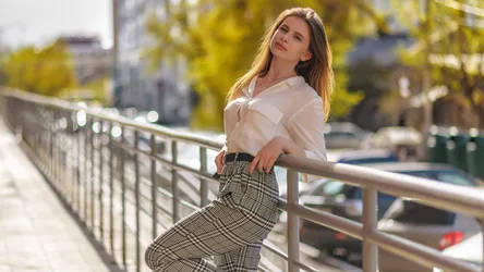 Woman in White Shirt and Plaid Skirt on Urban Bridge - free people & portraits wallpaper 2048×1152