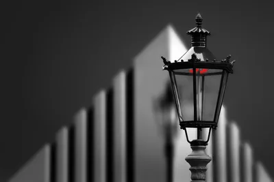 Historic Street Lamp with Red Flame at Dusk - free minimalist wallpaper 5120×3413