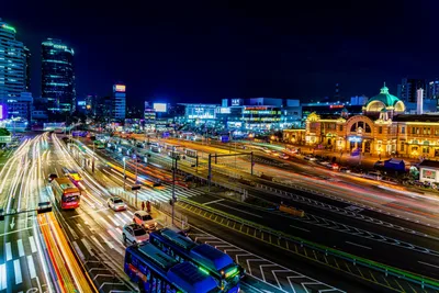 Night City Traffic and Historic Station with Light Trails - free wallpaper 7680×5123