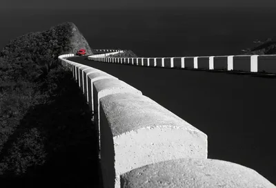 Red Truck on Concrete Highway Bridge Over Dark Water - free wallpaper 6120×4160