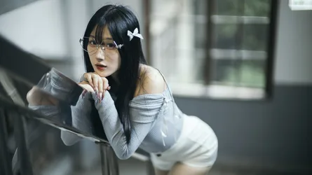 Woman in White Sweater with Glasses and Hair Bow - free wallpaper 4000×2248