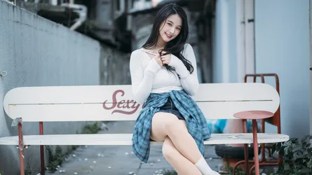 Young Woman Posing on Bench in Urban Alley - free people & portraits wallpaper 4000×2248