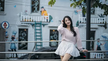 Young Woman Posing Against Street Mural Wall - free people & portraits wallpaper 4000×2248