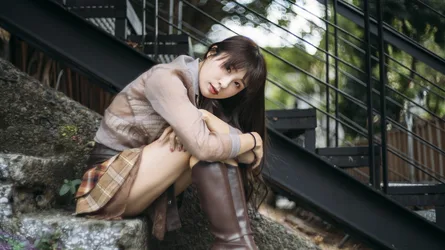 Young Woman Sitting on Stone Steps by Metal Railing - free people & portraits wallpaper 4000×2248