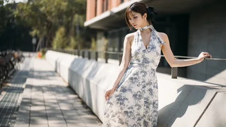 Woman in Floral Halter Dress on Urban Terrace - free people & portraits wallpaper 4000×2248