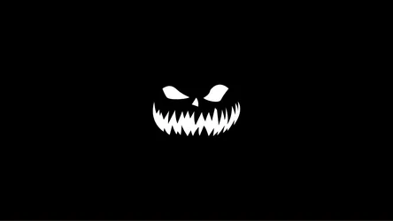 Sinister Halloween Pumpkin Face with Pointy Teeth - free wallpaper 8000×4500