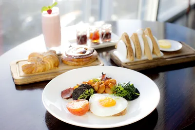Elegant Breakfast Spread With Fried Egg and Pastries - free food wallpaper 3000×2000