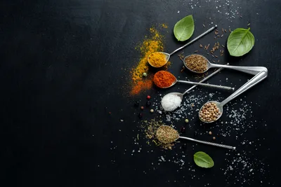 Culinary Spices and Herbs on Dark Slate Surface - free food wallpaper 2000×1333