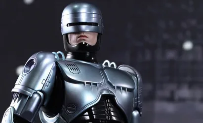 Cyborg Warrior in Silver Armor Against Dark Background - free movies & tv wallpaper 2000×1216