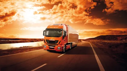 Red IVECO Semi Truck Driving on Desert Highway at Sunset - free cars & vehicles wallpaper 1920×1080