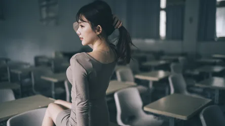 Woman in Classroom Seated at Desk Looking Away - free people & portraits wallpaper 4000×2250
