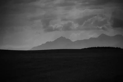 Alpine Wilderness Under Stormy Skies - free landscapes wallpaper 6000×4000