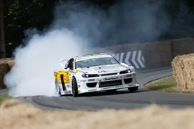 White and Yellow Sports Car Drifting with Tire Smoke - free cars & vehicles wallpaper 6144×4098