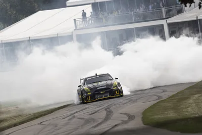 High-Performance Sports Car Drifting with Massive Tire Smoke - free wallpaper 5716×3813