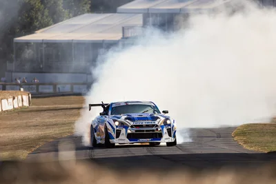 Blue Sports Car Drifting With Massive Tire Smoke - free wallpaper 6144×4098