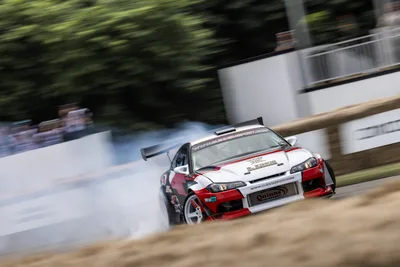 Red and White Sports Car Drifting with Smoke Trail - free wallpaper 6144×4098