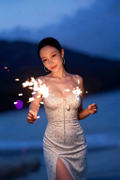 Woman With Sparklers at Twilight by Water - free people & portraits wallpaper 4800×7200