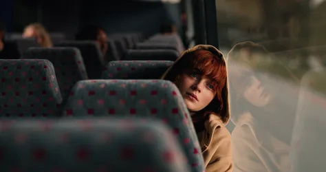 Sadie Sink on a Bus Window Reflection - free photography wallpaper 3840×2024