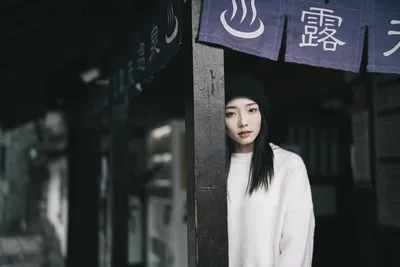 Woman in White Sweater by Japanese Shop Signs - free people & portraits wallpaper 4000×2667